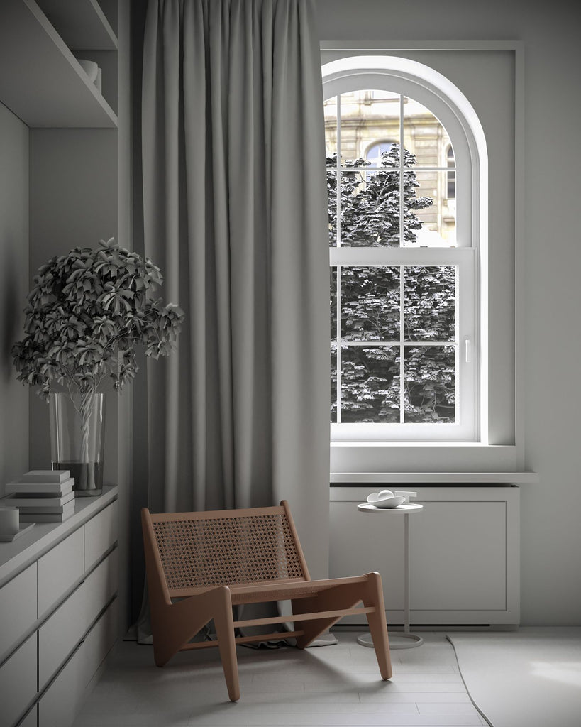 A wooden chair beside curtains and a large window in a quiet interior