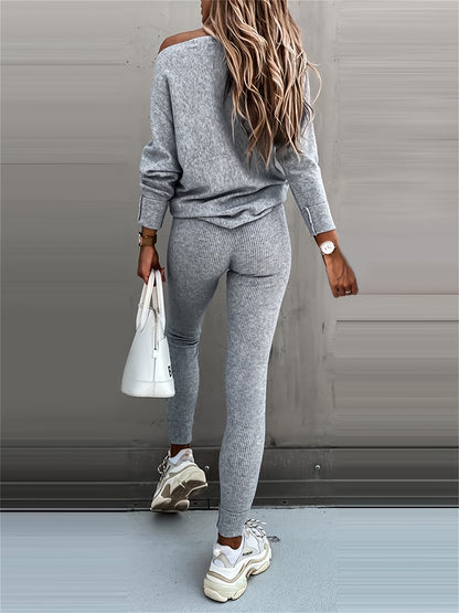 Casual Two-Piece Outfit Featuring A Long-Sleeve Pullover And High-Waisted Drawstring Pants