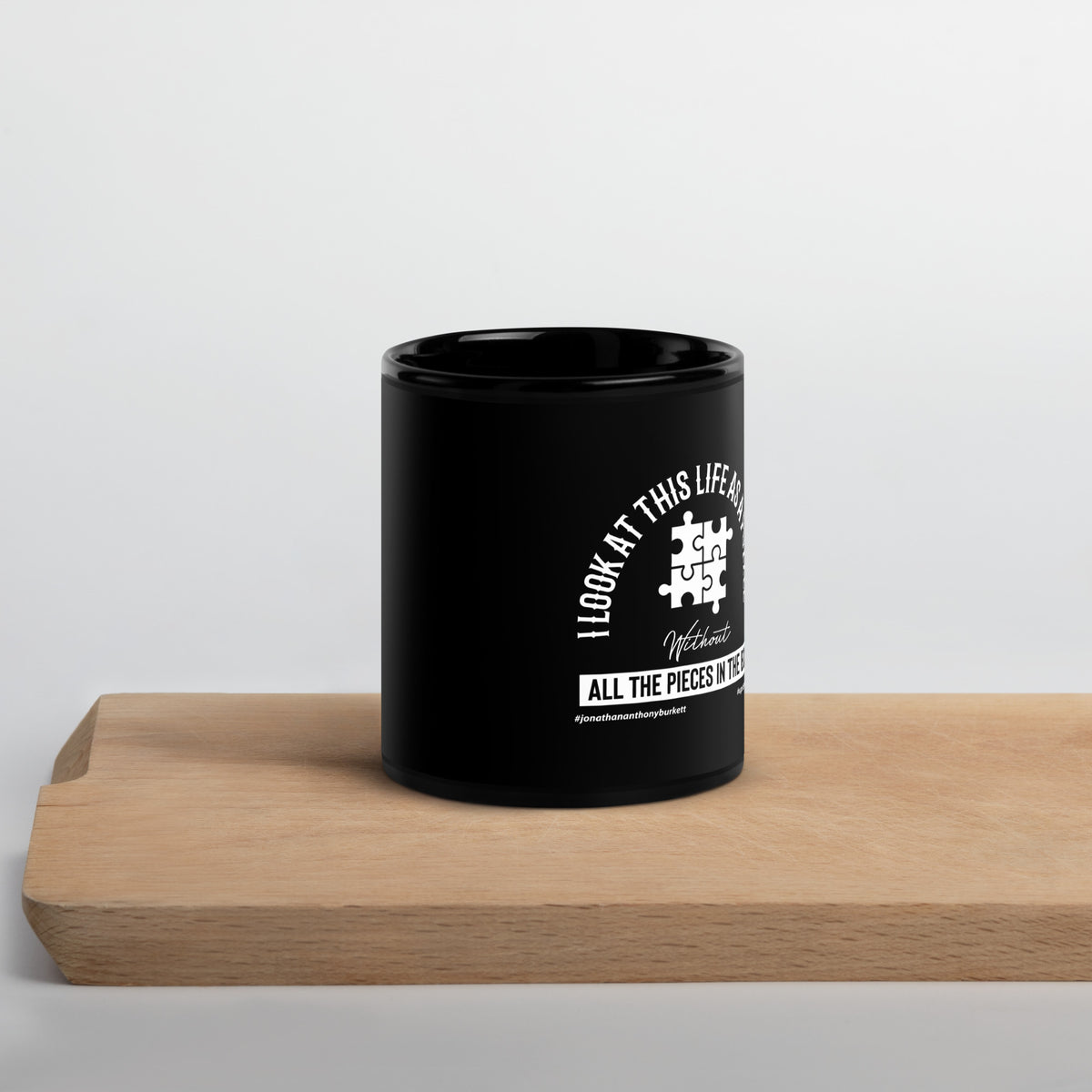 I Look At This Life As A Puzzle Upstormed Black Glossy Mug