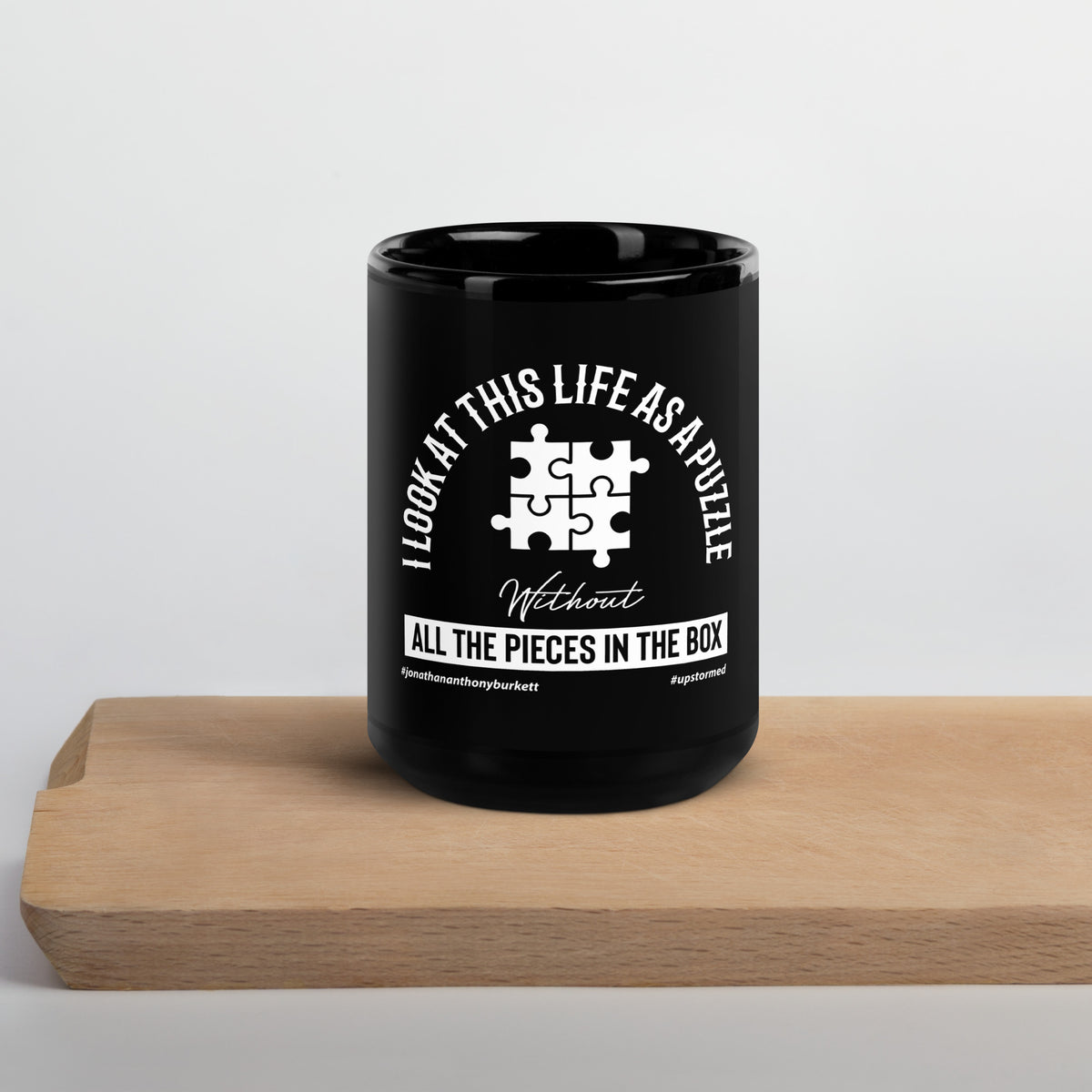 I Look At This Life As A Puzzle Upstormed Black Glossy Mug